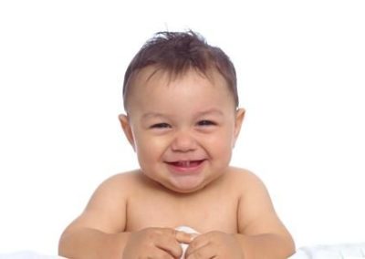 When & Why a Baby Smiles